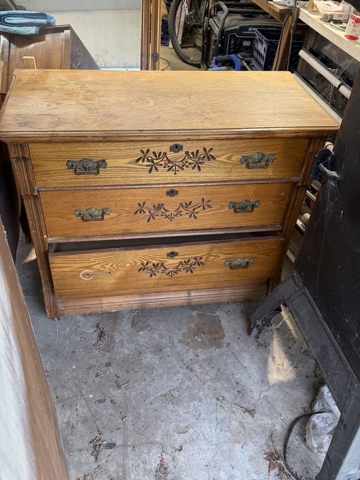 Carved oak dresser awaiting restoration
