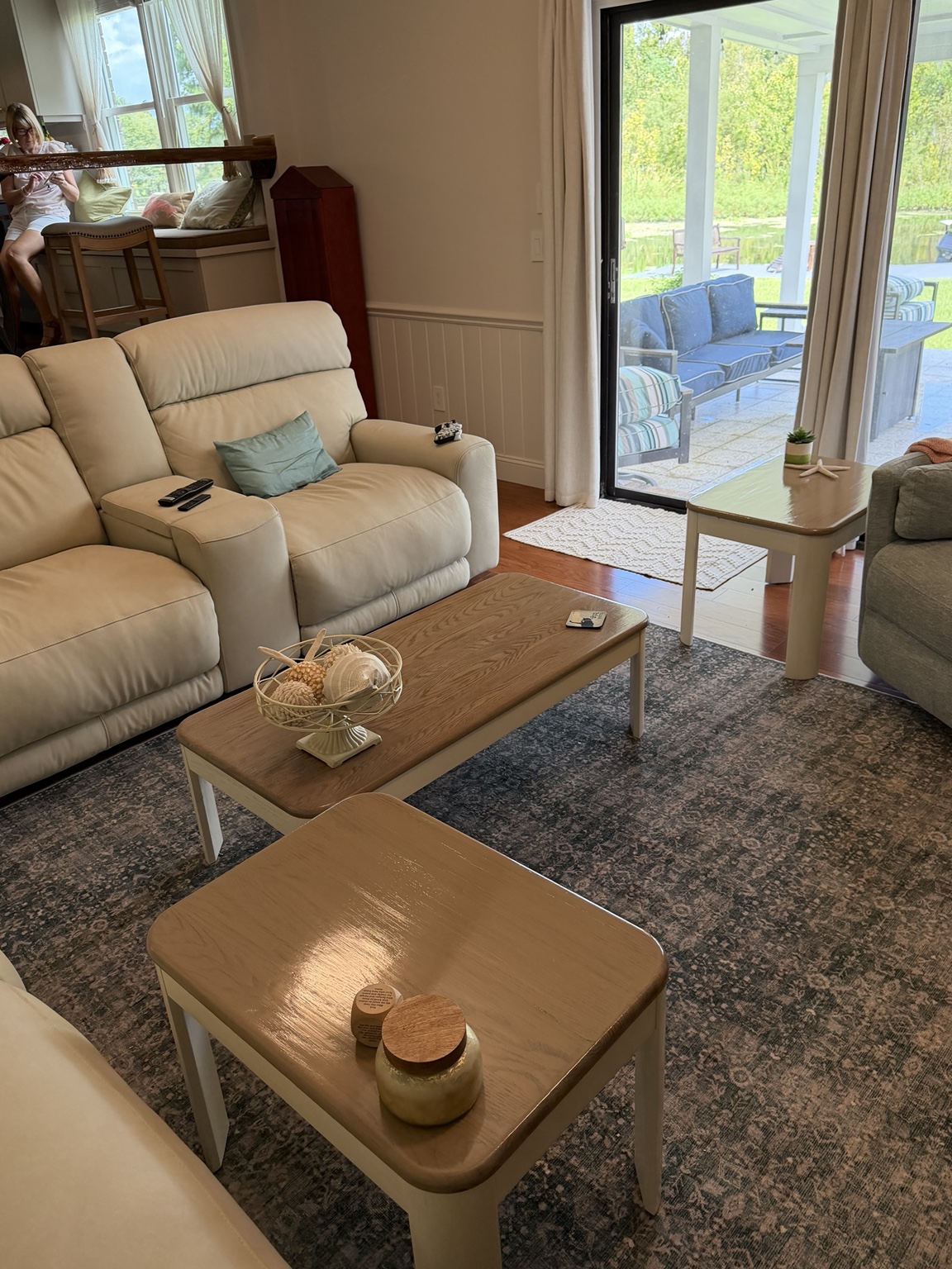 Solid oak coffee and end tables after restoration in a living room